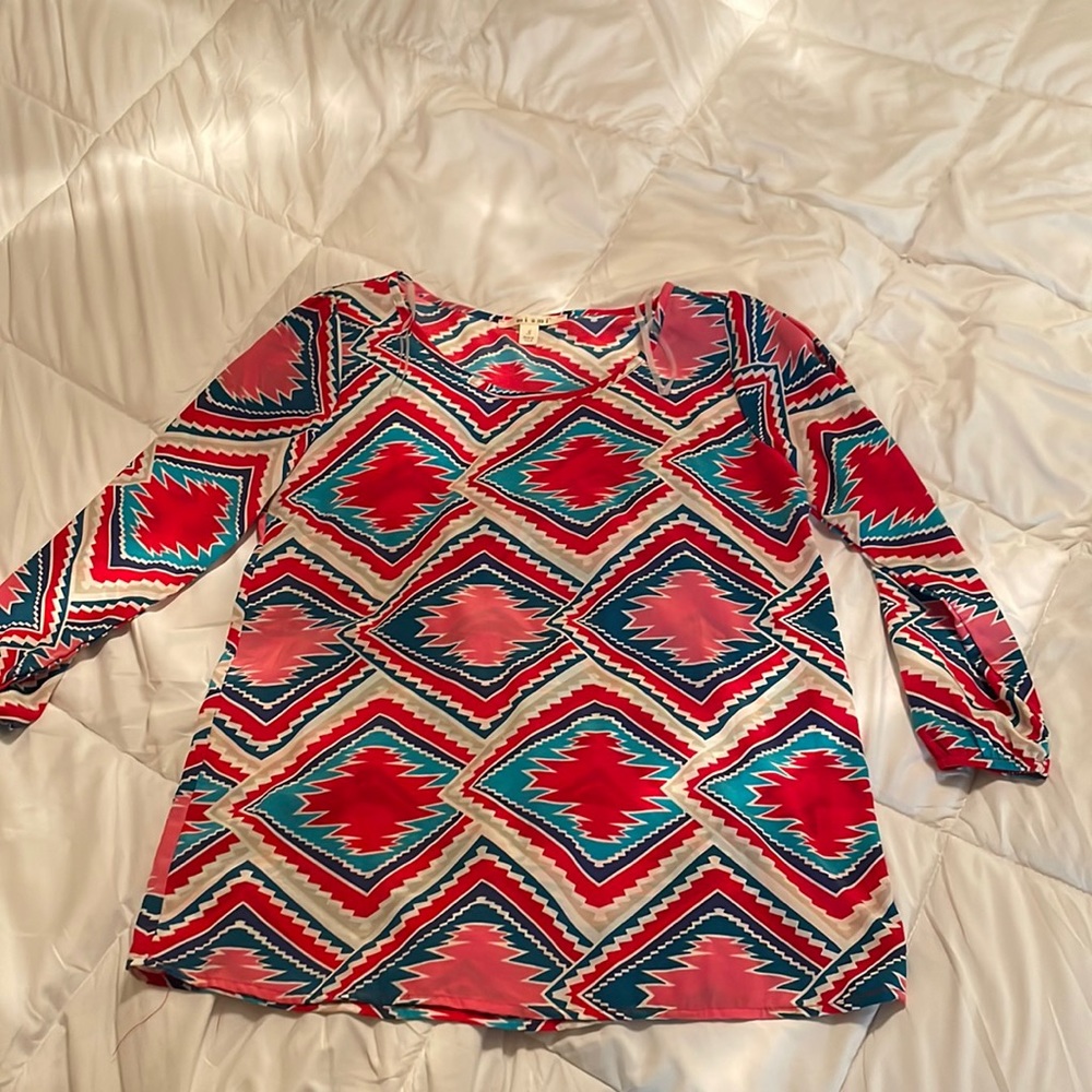 Francesca’s Aztec patterned blouse